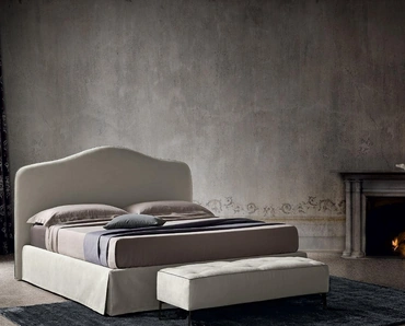 Letto in tessuto con testiera sagomata Damian di Felis