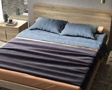 Letto in essenza legno con testiera Glow di Mab
