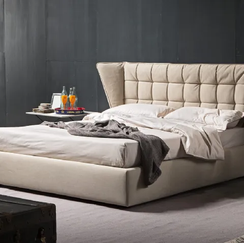 Letto matrimoniale con testiera imbottita morbida e avvolgente trapuntata a quadri e comodo box contenitore Flower di Novaluna
