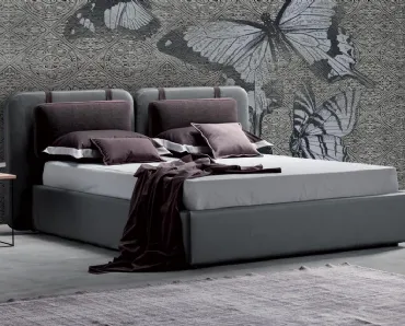Letto in pelle imbottito con testiera ampia e sdoppiata Sound di Novaluna