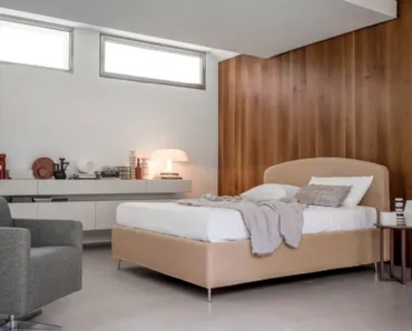 Letto in ecopelle con testiera arrotondata Duse di Rigosalotti